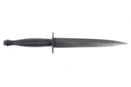 A British Commando Knife by R Cooper. The double edged blade length 17.