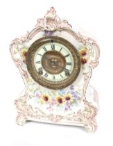 An Ansonia USA 8 day striking Royal Bonn ceramic mantel clock.