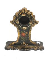 A Victorian papier mache pocket watch stand.