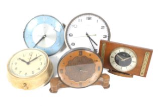 A collection of five assorted vintage English clocks. Including Smiths Sectric and Metamec.