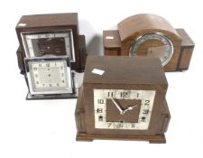 Four Art Deco style mantel clocks sold as parts. Of various designs, all with wooden cases, Max.