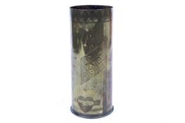 A WWI trench art brass shell case vase.