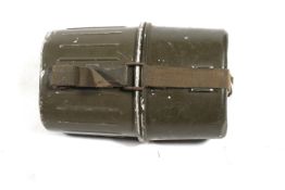 A German army canteen/mess kit. Marked 'PSL 75/76', containing a water bottle and webbing strap.