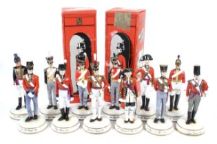 12 Michael Smithy hand painted porcelain soldiers and certificates.