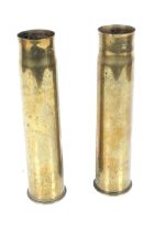 A pair of WWI trench art shell cases converted into vases.