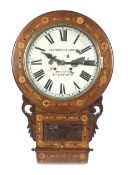 An inlaid wood cased pendulum wall clock by Fattorini & Sons, Bradford.