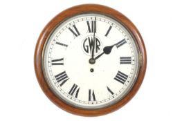 A GWR circular mahogany cased fusee wall clock. #G. W. R. 3847 label.