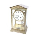 A French Couillet Freres 8 day brass cased mercury pendulum mantel clock.