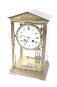 A French Couillet Freres 8 day brass cased mercury pendulum mantel clock.