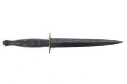 A reproduction of the 1940s Fairburn Sykes fighting knife.