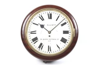 A vintage 'school' pendulum wall clock W Elliott. Mahogany case with Roman numerals.