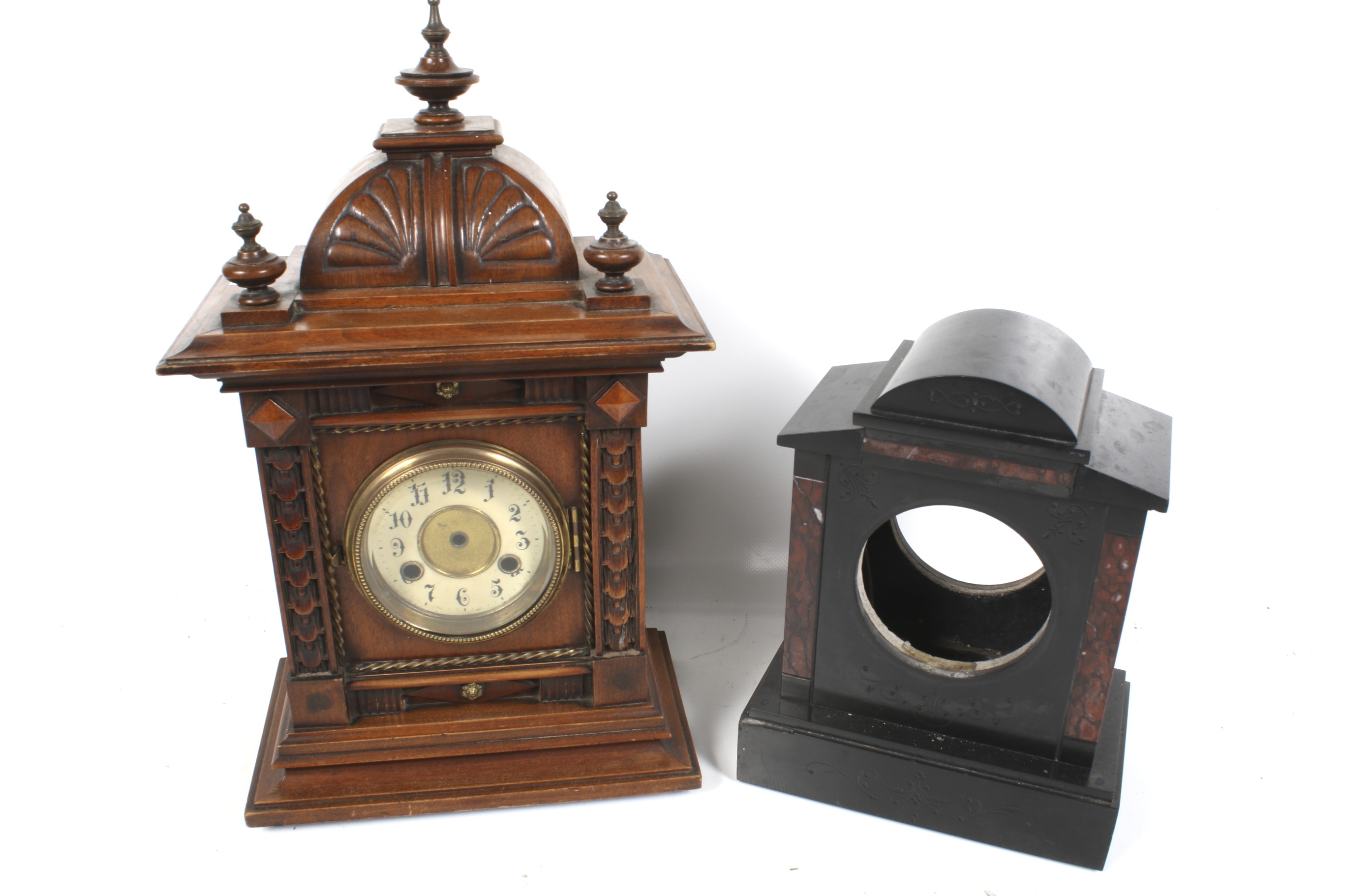 Two vintage mantel clock cases. Including a black marble mantel clock case.