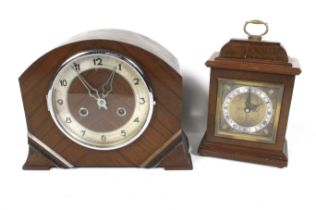 Two clocks. Including a F. W. Elliot bracket clock inscribed Kemp Bros. Bristol.