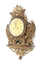 A 20th century Swedish konsk Svensk Traslojd 8-day wall clock.