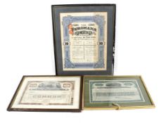 Three vintage Oil and Railway company share certificates. Framed and glazed.