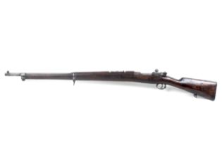 A Mauser model 1898 7mm calibre bolt action rifle.