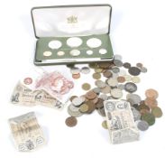 A Trinidad and Tobago 1975 proof set of coins and a small quantity of world coins.