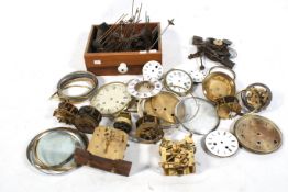 A collection of assorted vintage mechanical clock mechanisms and parts.
