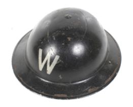 A WWII Civil Defence warden's helmet,