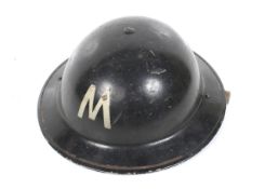 A WWII Civil Defence messenger's helmet,