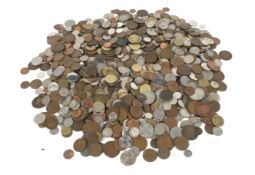 A large quantity of world coins. Including some pre-1947 silver.