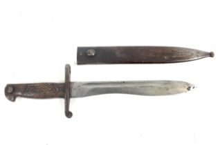A Spanish WWII 1941 Bolo bayonet and scabbard. With steel scabbard. Total length circa 40.
