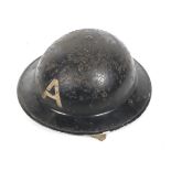 A WWII Civil Defence Helmet.