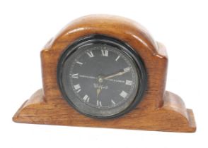 A vintage North & Sons Ltd mechanical car timepiece.