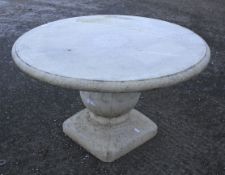 A concrete garden table.