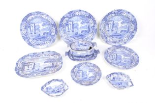 An assortment of blue and white transfer printed ceramics.