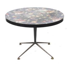 A painted circular top table. On a single pedestal metal base.