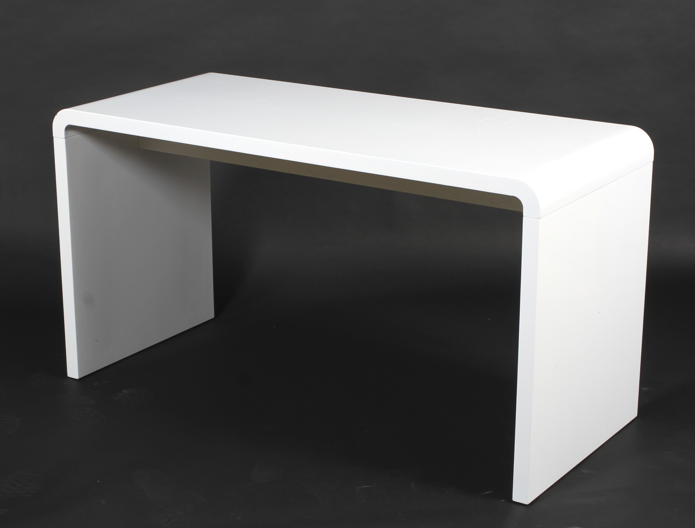 A contemporary Dwell white office desk.