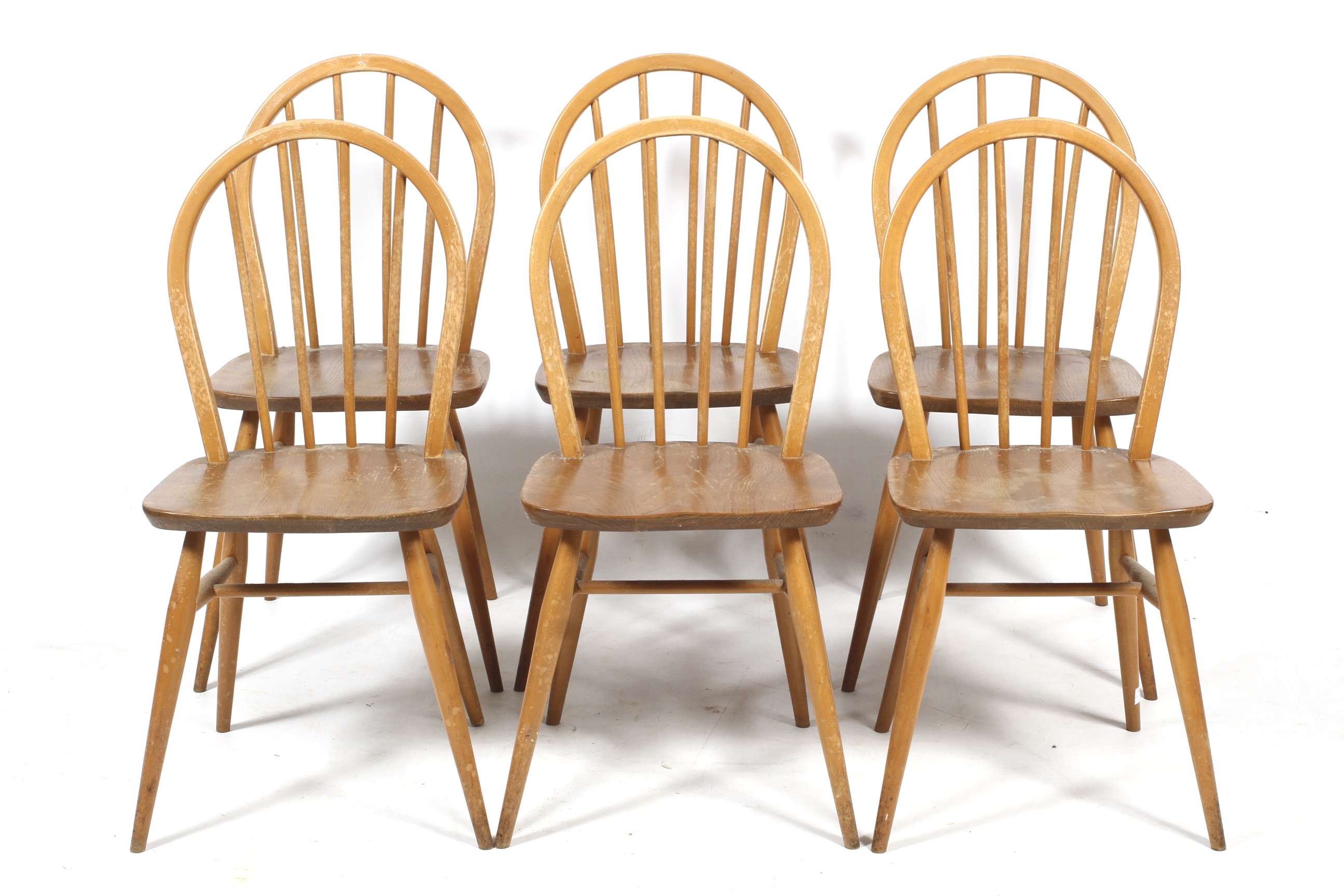 A set of six mid-century Ercol dining chairs.