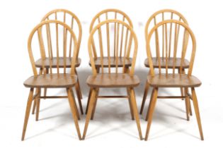 A set of six mid-century Ercol dining chairs.