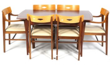 A mid-century Ian Henderson Design Heals dining table and six chairs.