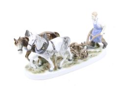 A Graefenthal porcelain group. Modelled as a pair of horses ploughing.