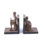 A vintage pair of carved wooden bookends. In the shape of Don Quixote and Sancho Panza.