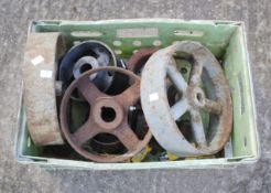 A quantity of assorted metal pulley wheels, etc.