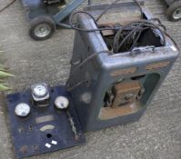 A vintage Westalite battery charger and a Ransomes gauges. Sold as parts.