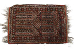 A Persian style prayer rug.