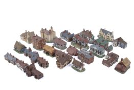 A collection of twenty-five assorted Heritage Houses limited edition models. Max.