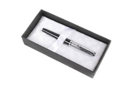 A Diplomat Excellence black and chrome fountain pen. Stamped 14K nib, cased and boxed.