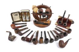 A collection of vintage smokers' tobacco pipes.