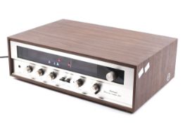 A mid-century Sansui 210 Stereo AM/FM Tuner Amplifier. S/N 014032557.