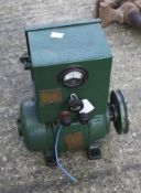 A vintage battery charger and motor.