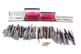 A collection of approximately ninety two fountain and ball point pens.