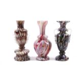 Three assorted mid-century Murano Fratelli Toso style multicolour glass vases.