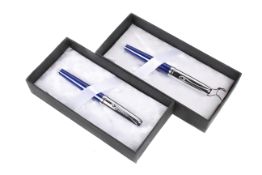 Two Diplomat Excellence blue fountain pens. Cased and boxed.