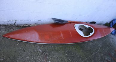 A kayak and oar.