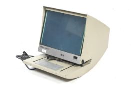 A Bell & Howell SR-IV 42x microfiche reader. Serial No. 60051.